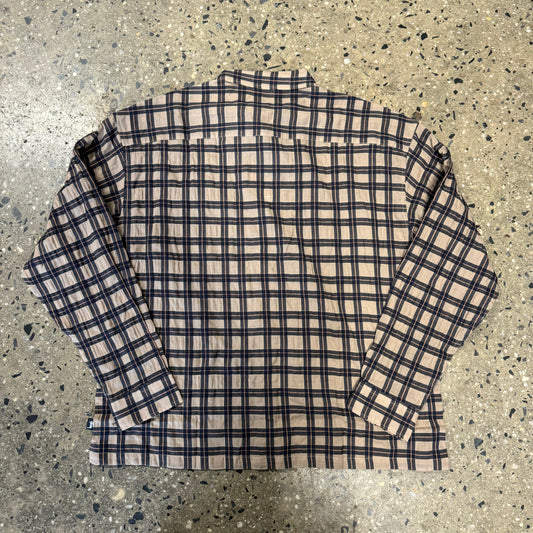 rear view of black and tan button down shirt