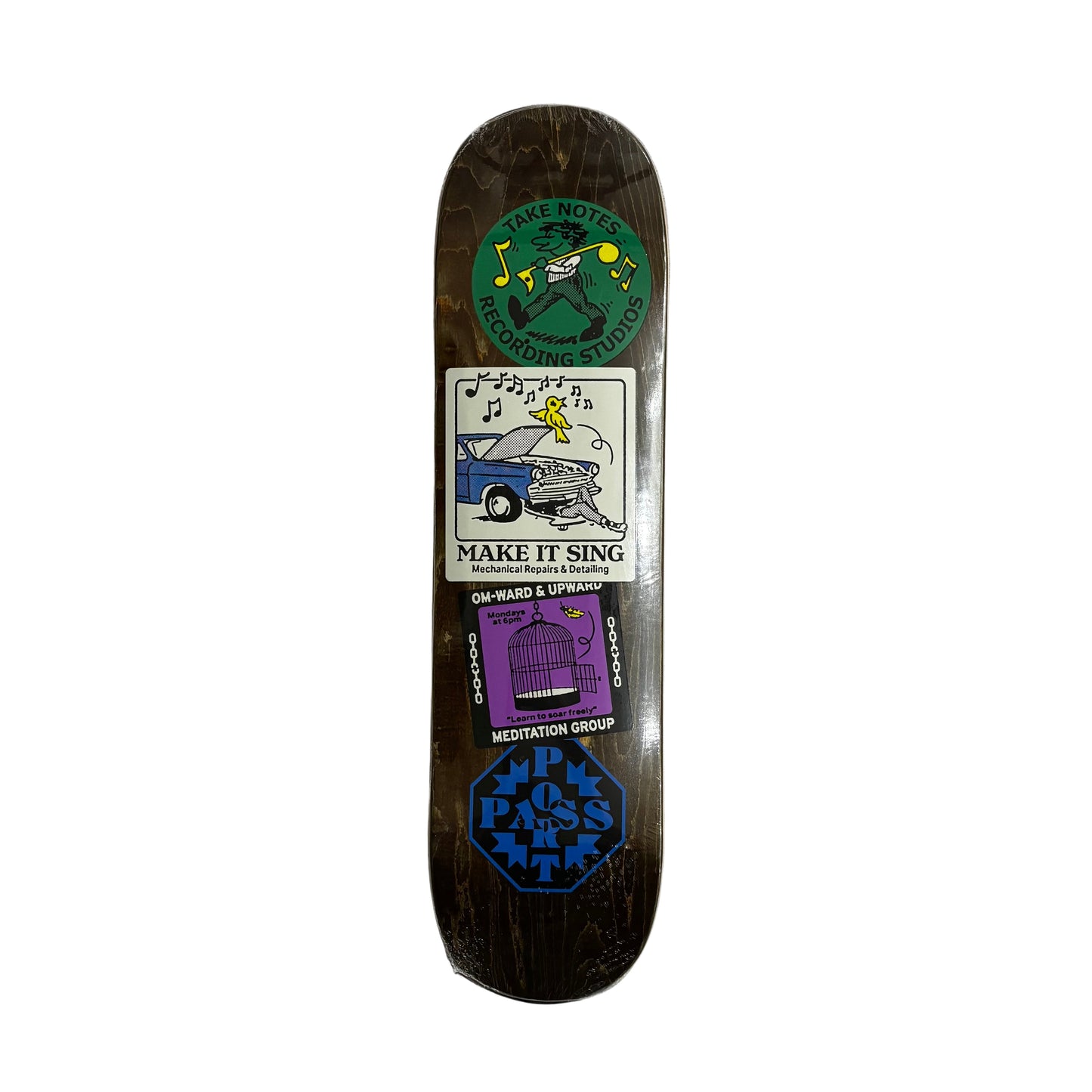 Skateboard deck with sticker style graphics on a white surface