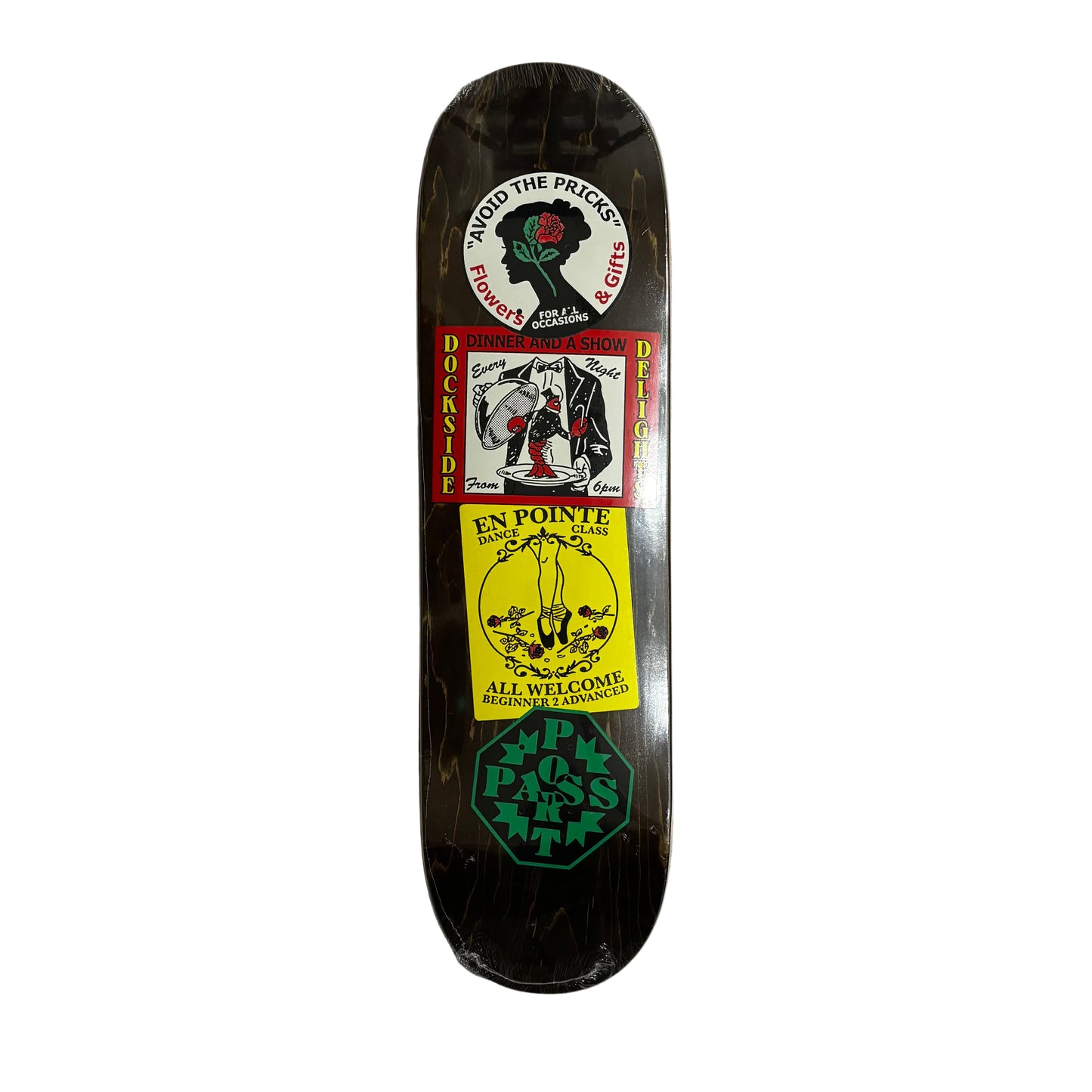 Skateboard deck with multiple sticker graphics on a white surface