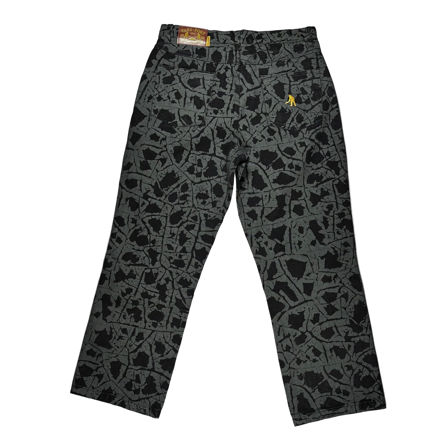 Black patterned pants on a white background