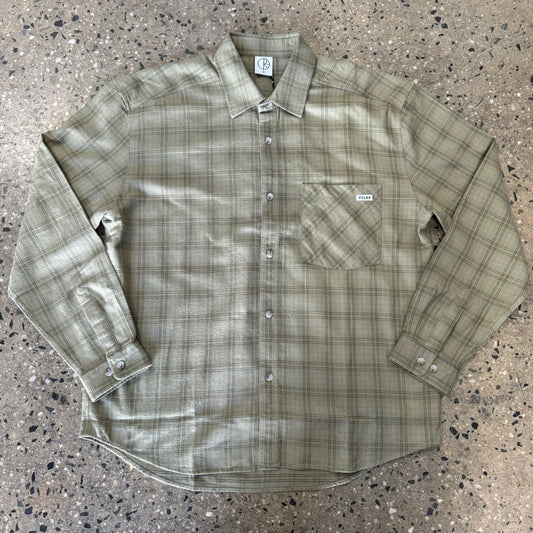 green and beige button down flannel shirt