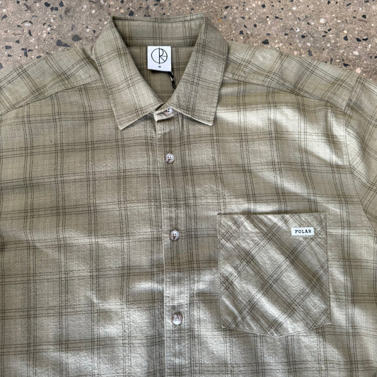 closeup of plaid and pocket of front of shirt