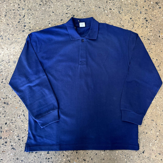 dark blue rugby shirt, long sleeves and collar