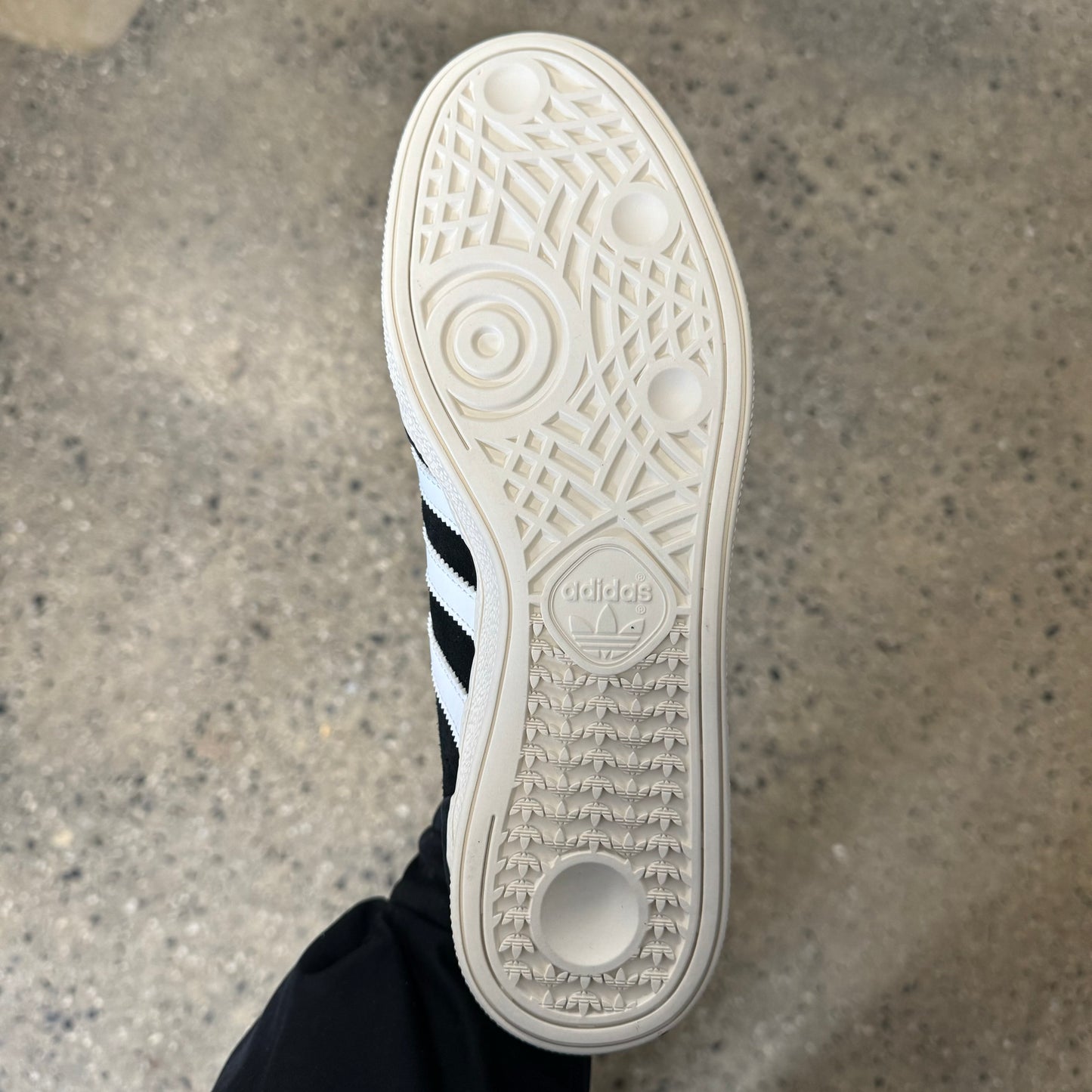 white sole, bottom of sneaker