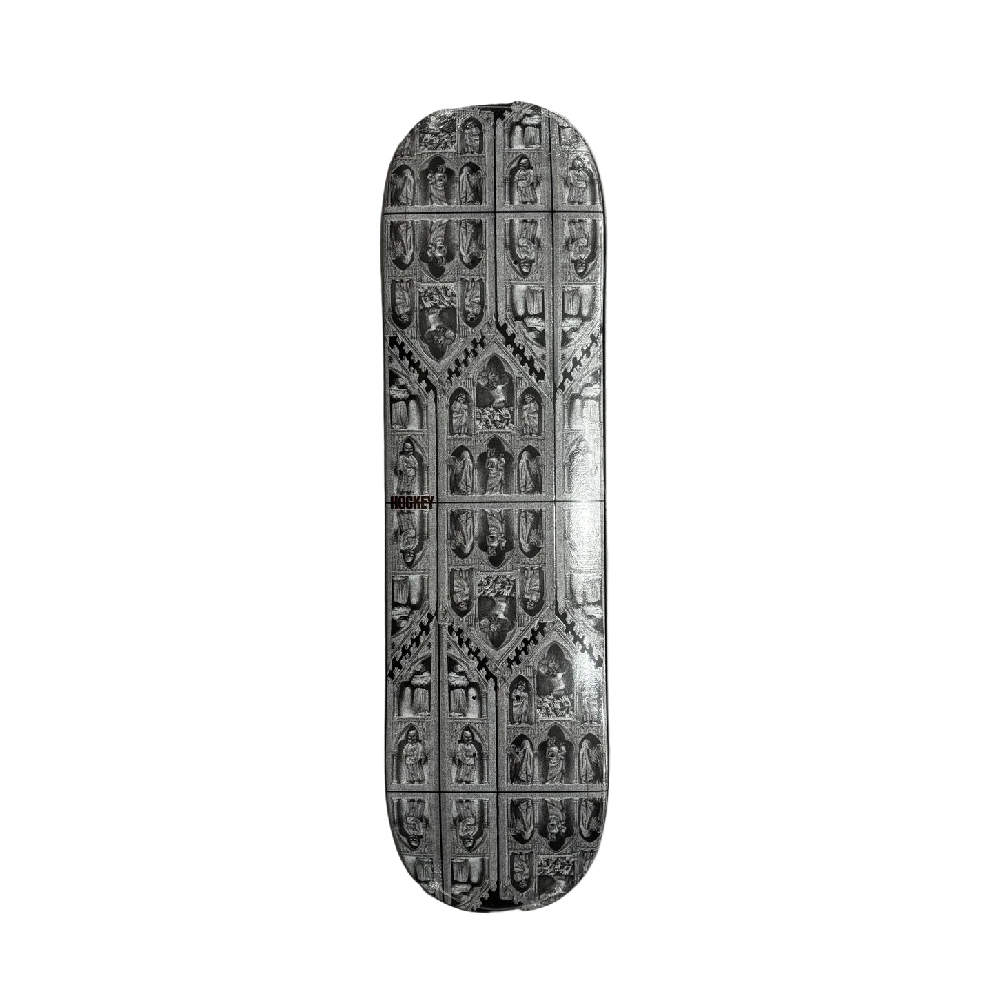 Decorative skateboard deck with intricate patterns on a white surface