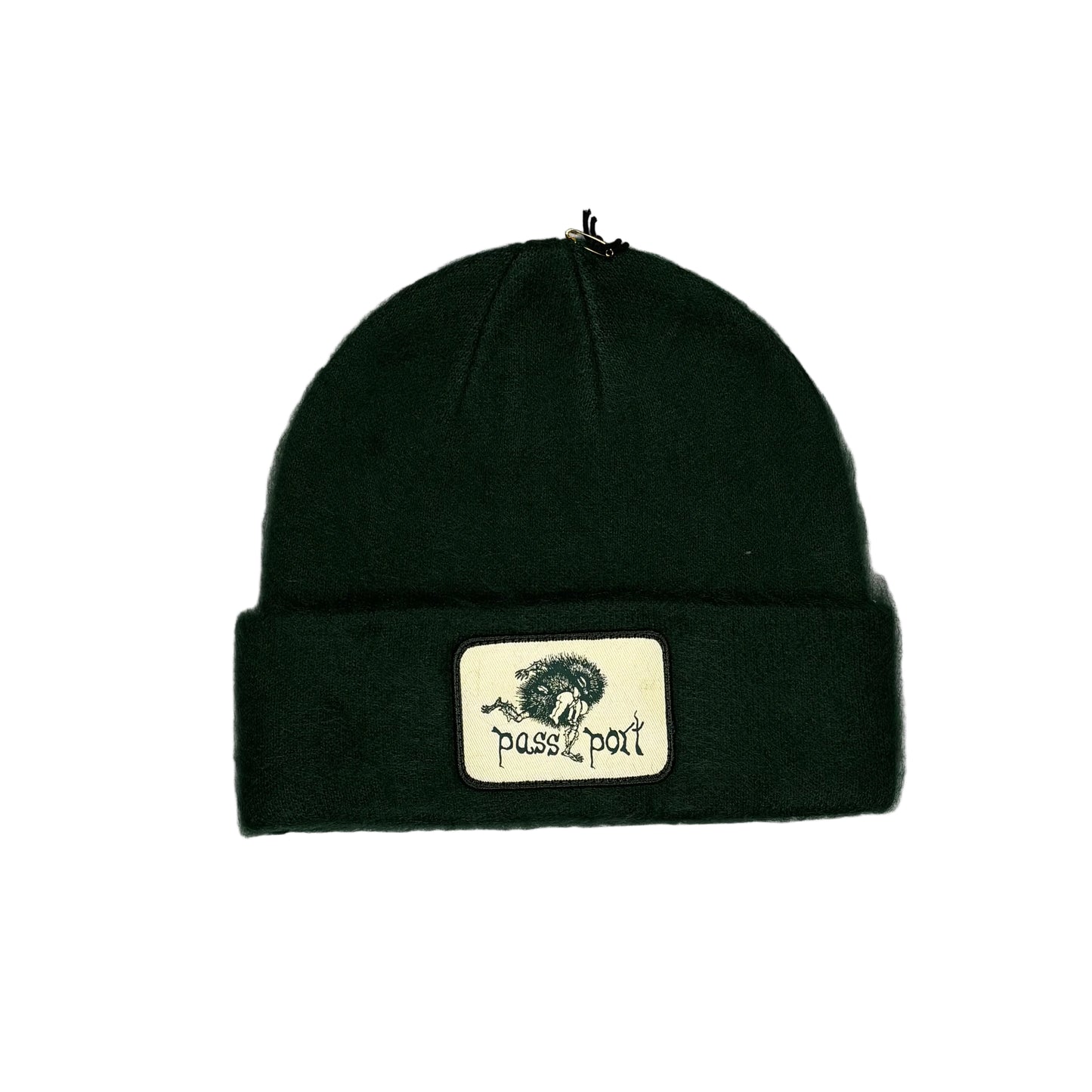 forest green beanie with a logo patch on a white background