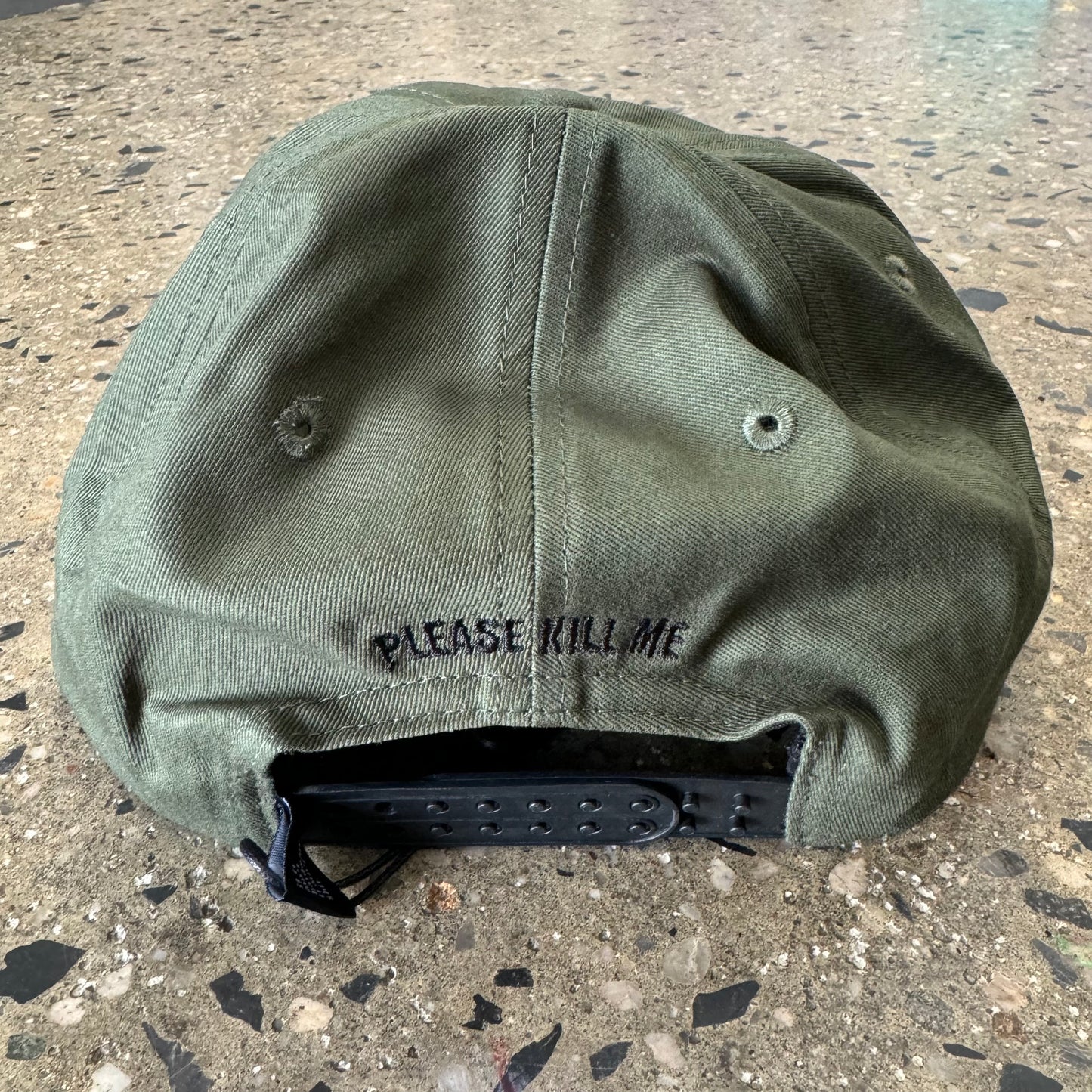 back view of green hat