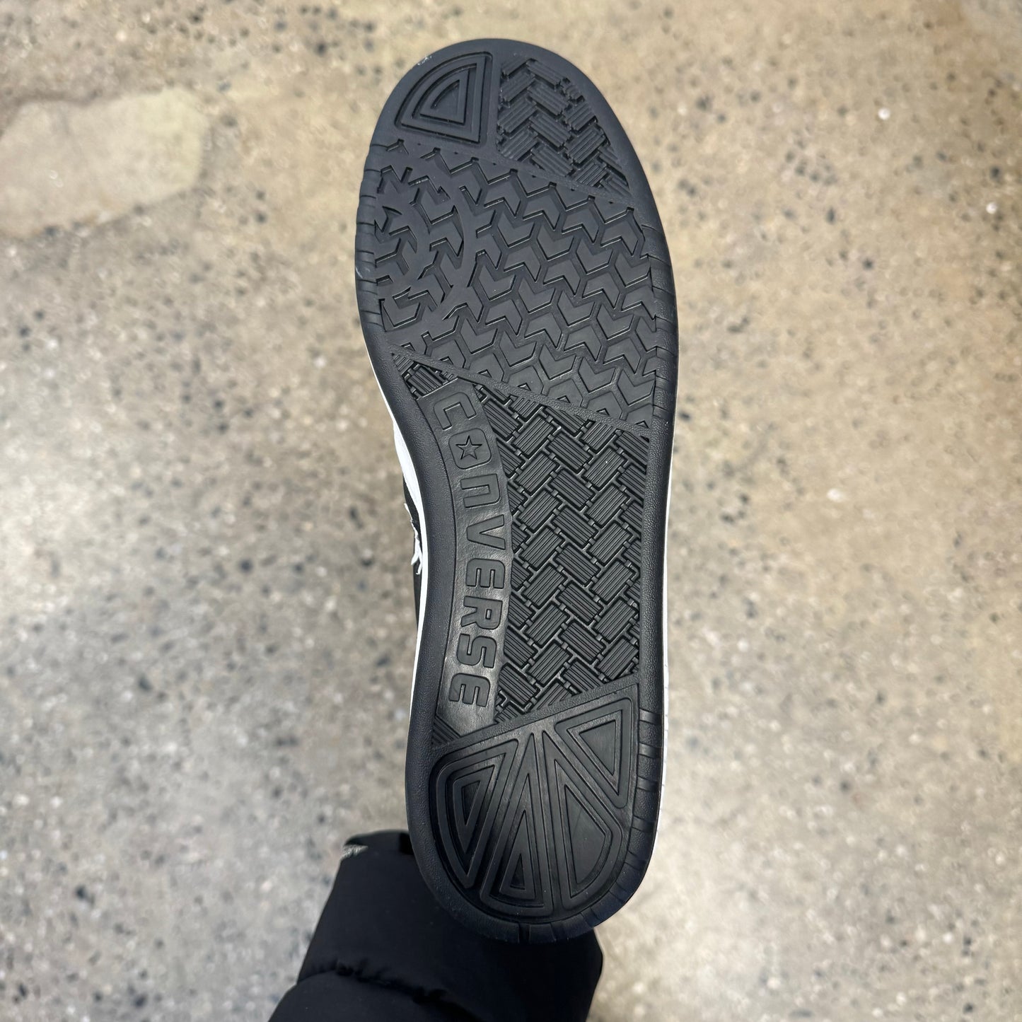 black sole, bottom of sneaker