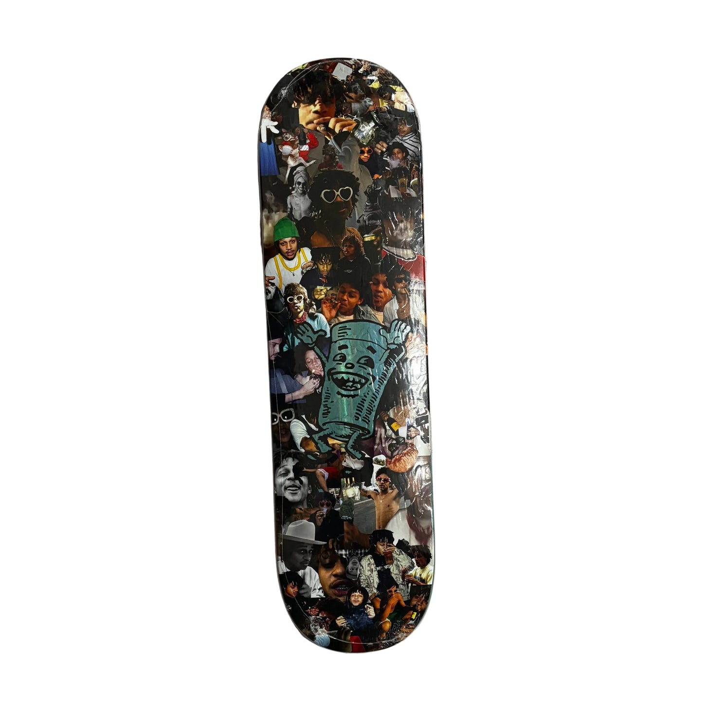 Skateboard deck with collage design on a white surface