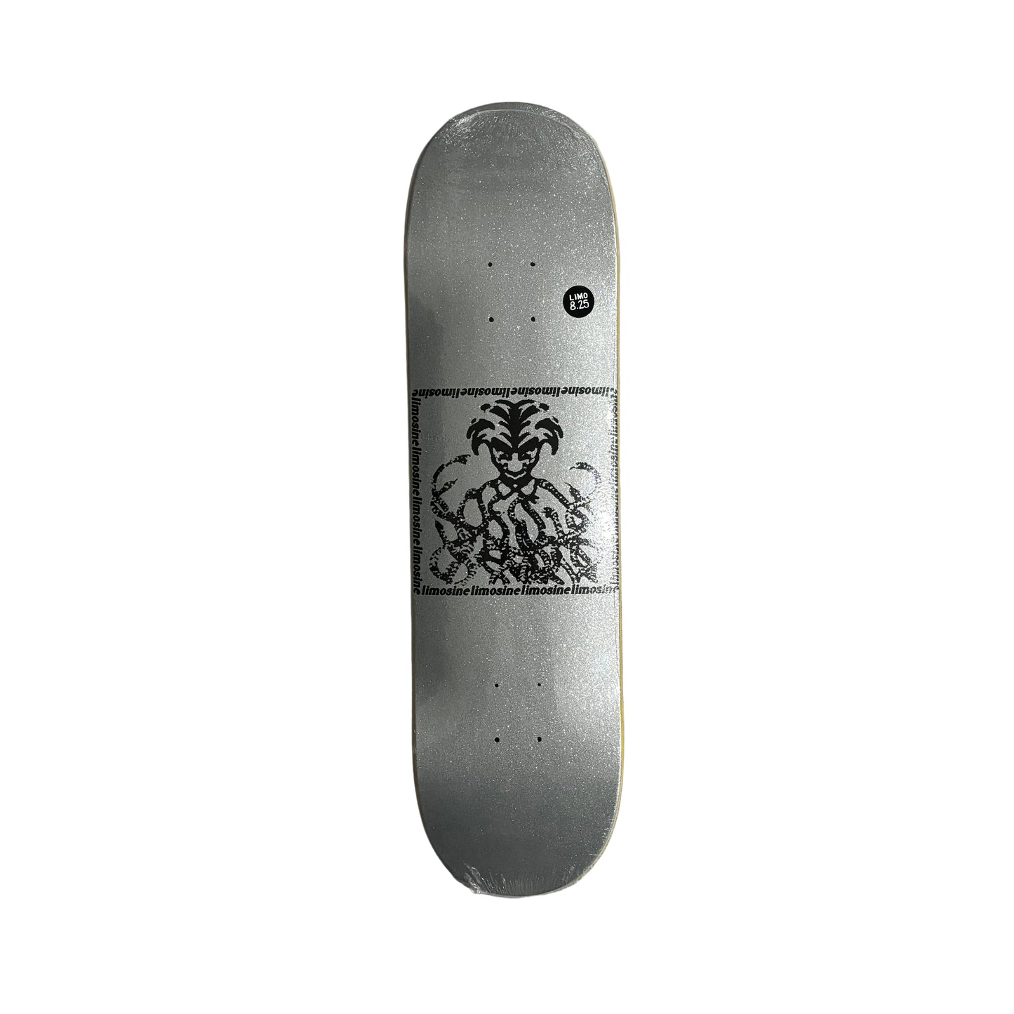 silver glitter Skateboard deck with a black graphic design on white surface