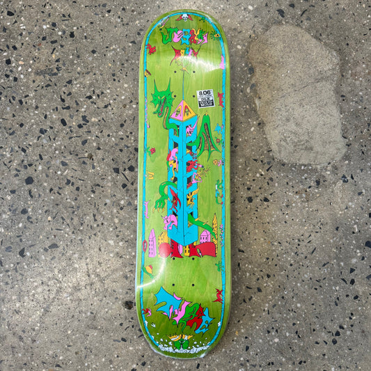 multi color dragon and tower graphic on wood grain skate deck, wood grain varies
