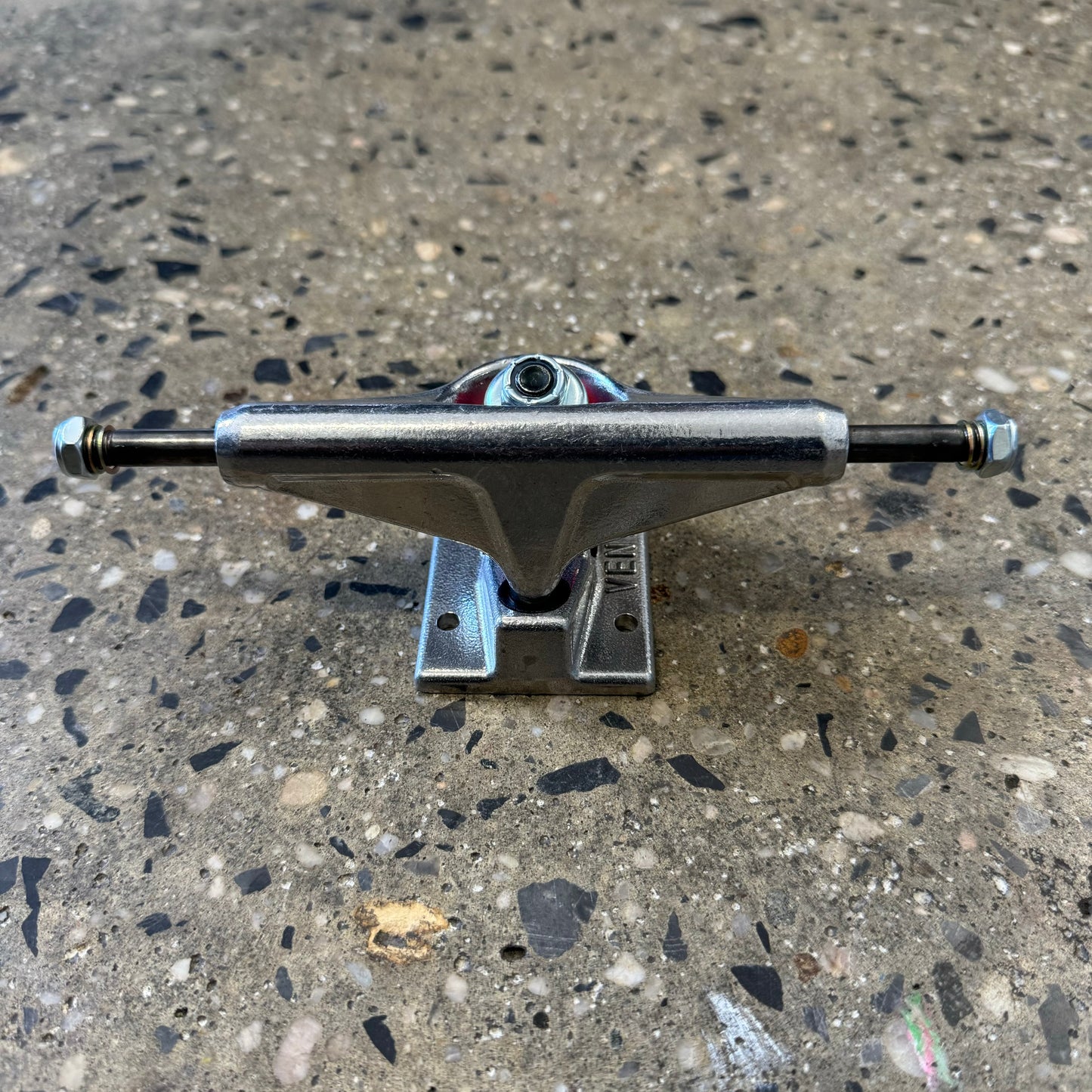 front view of venture skateboard truck, silver polished hanger