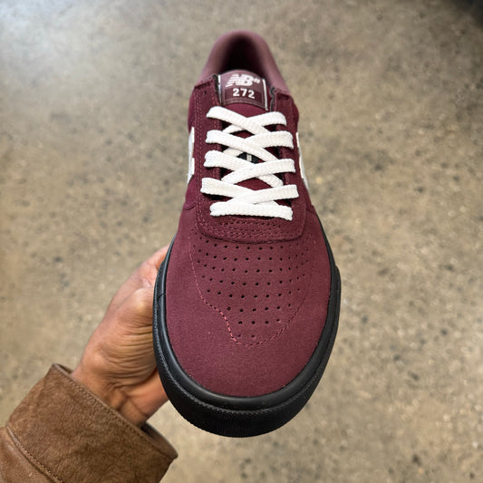 burgundy suede sneaker with white N and black sole, front view