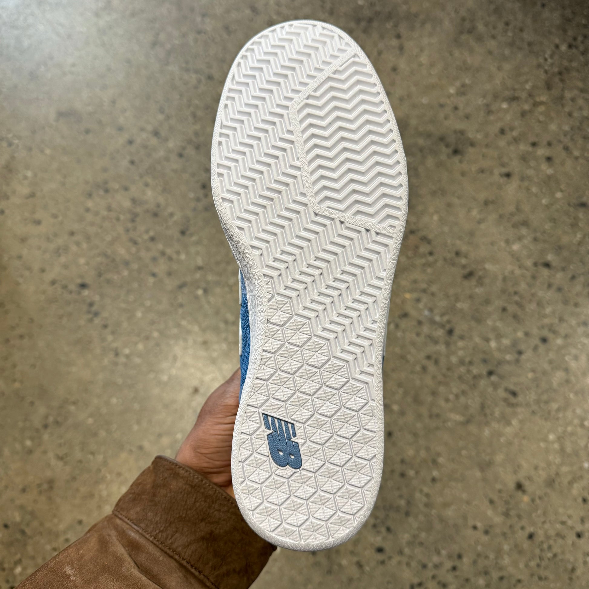 white sole, bottom of sneaker