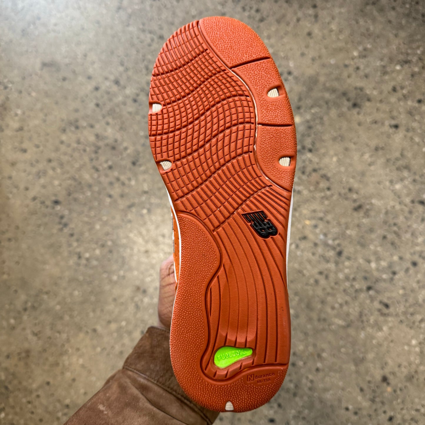 rust sole, bottom of sneaker