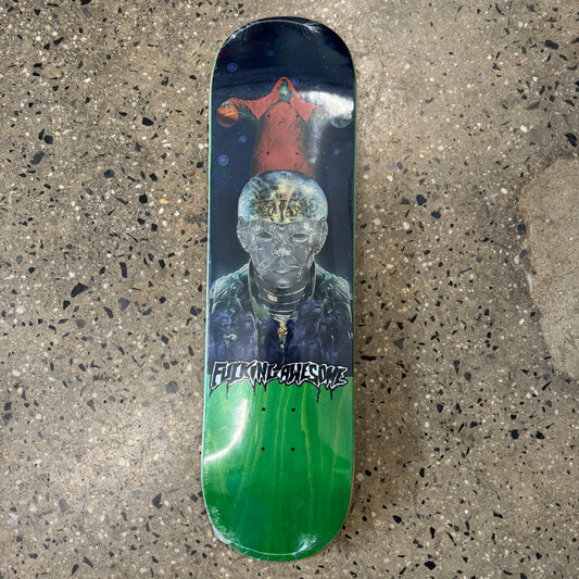 monster drawing on black and green skate deck