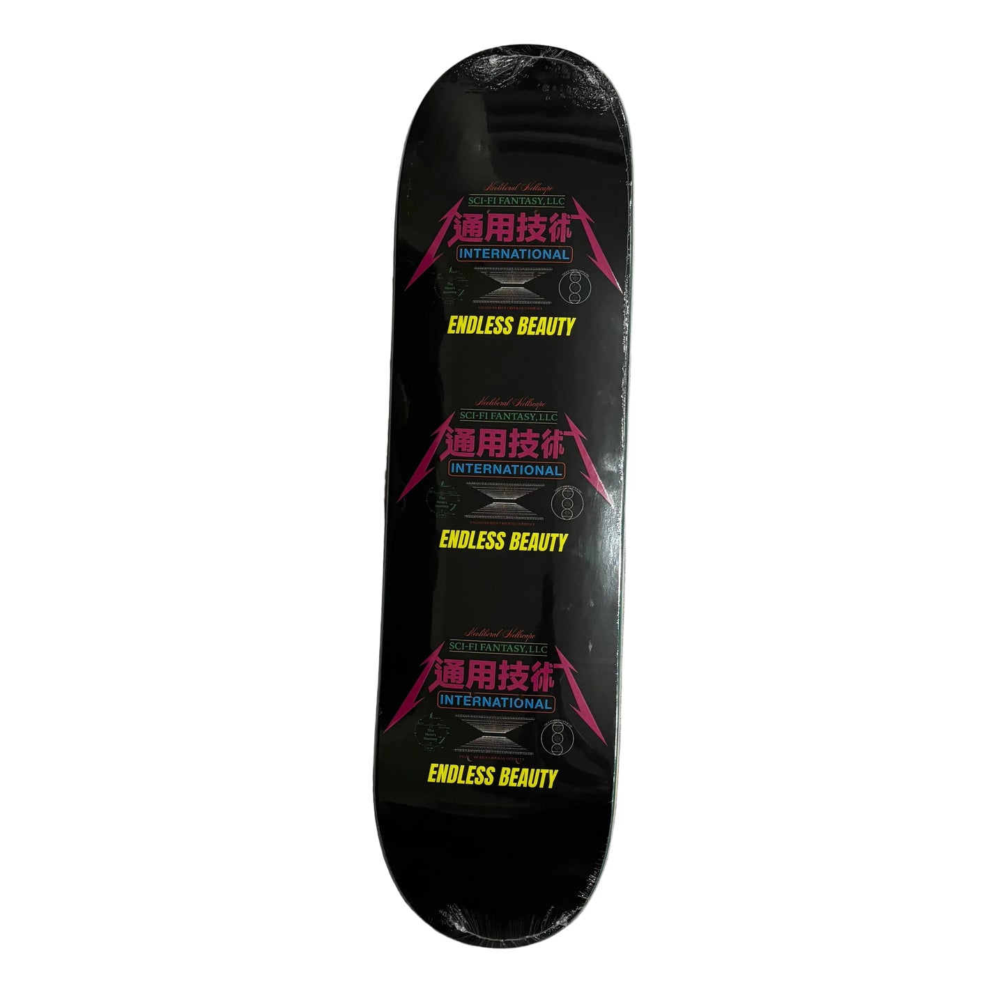 Black skateboard deck with yellow and red text on a white background