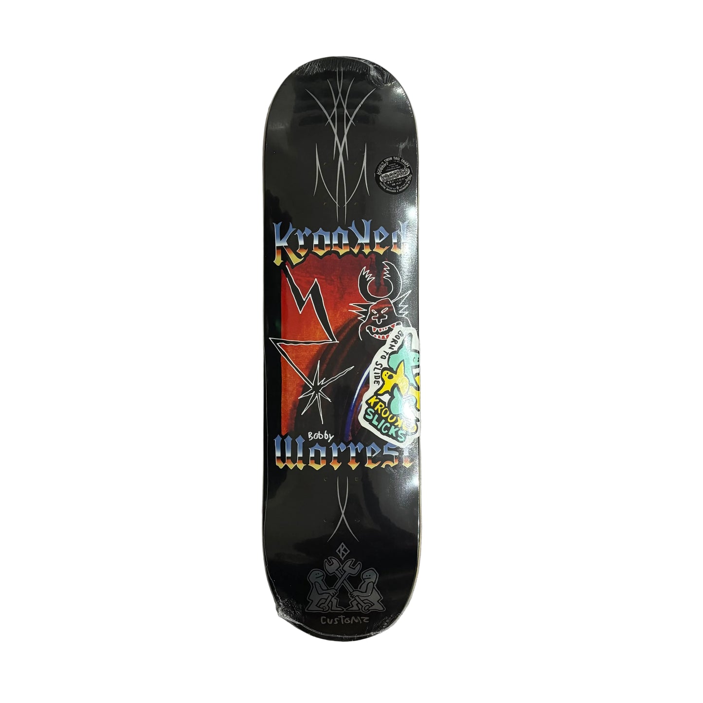 Skateboard deck with colorful playful heavy metal graphics on a white surface