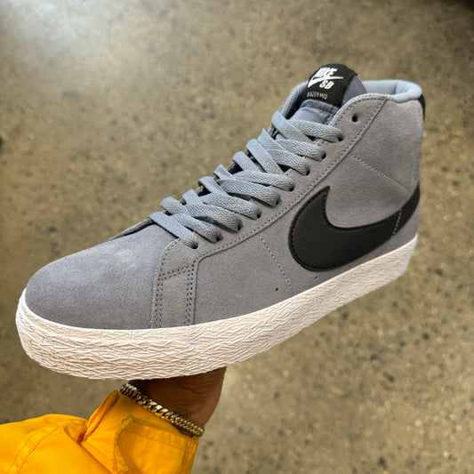 grey and black hi top sneaker with white sole
