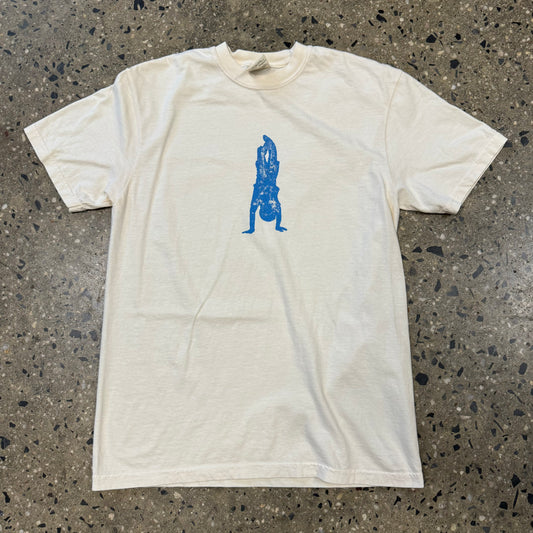 blue person doing a handstand on white T-shirt