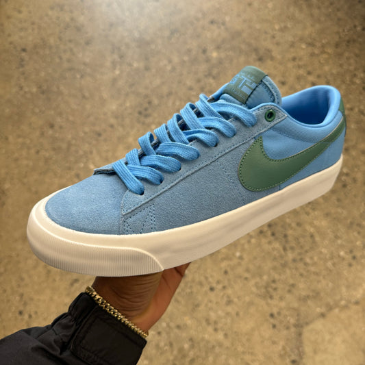 light blue and green suede sneaker with white sole