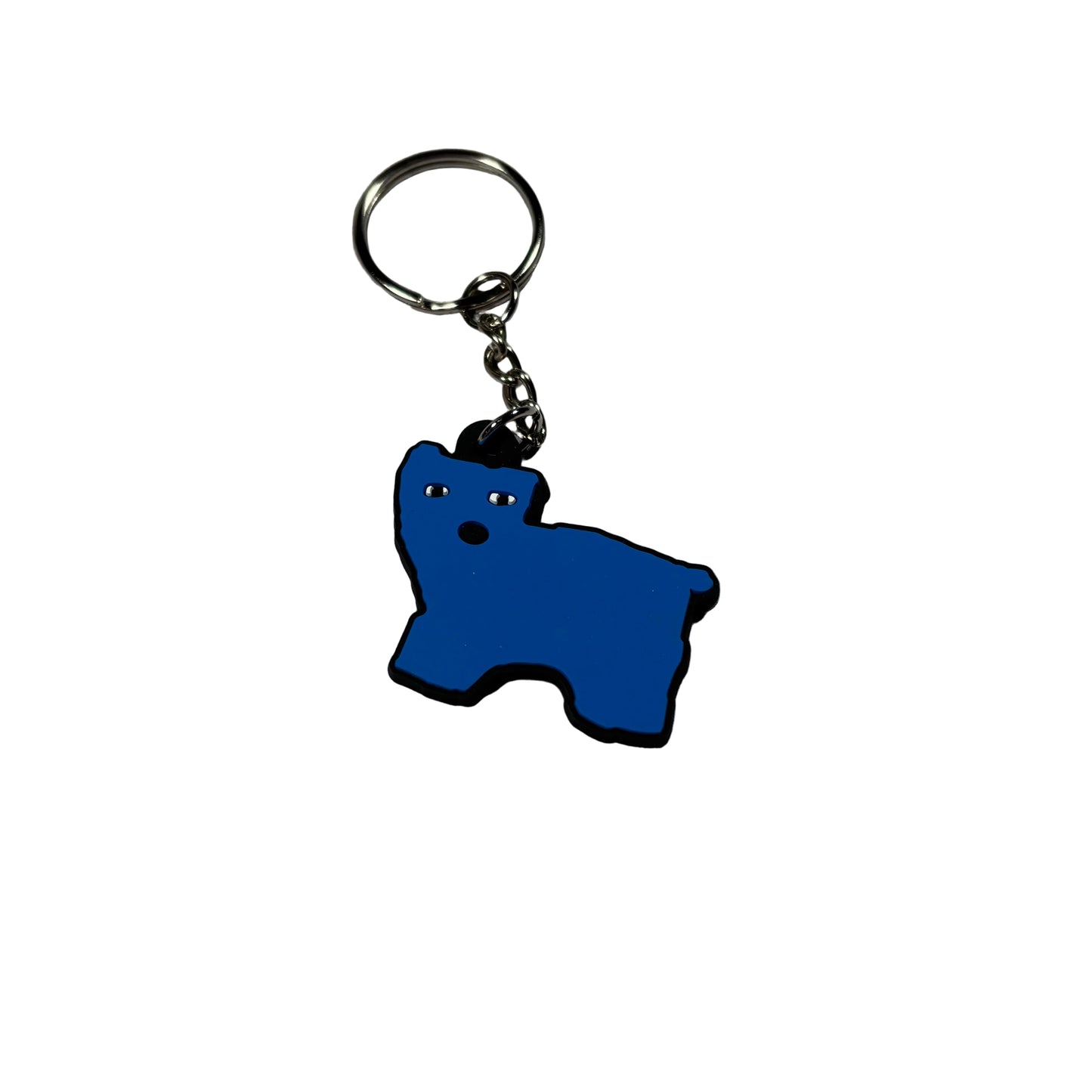 Blue cat-shaped keychain on a background
