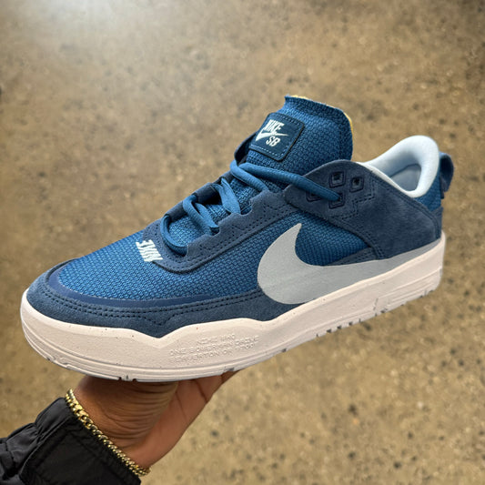 blue and white sneakers with white sole