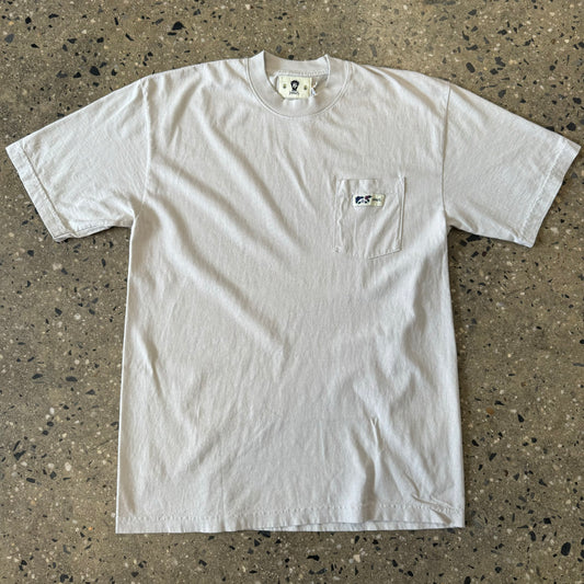 white pocket T-shirt with logo
