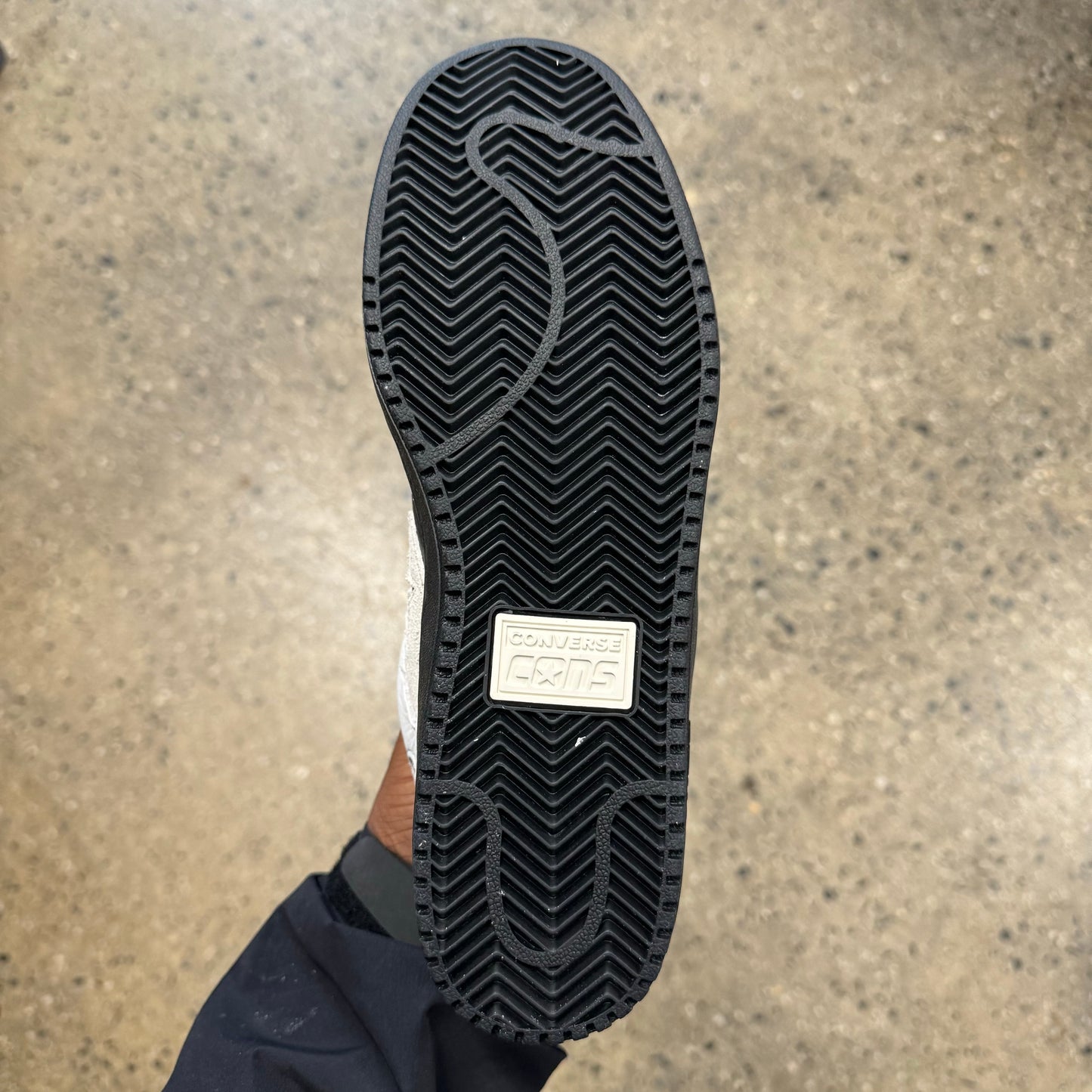 black sole, bottom of sneaker