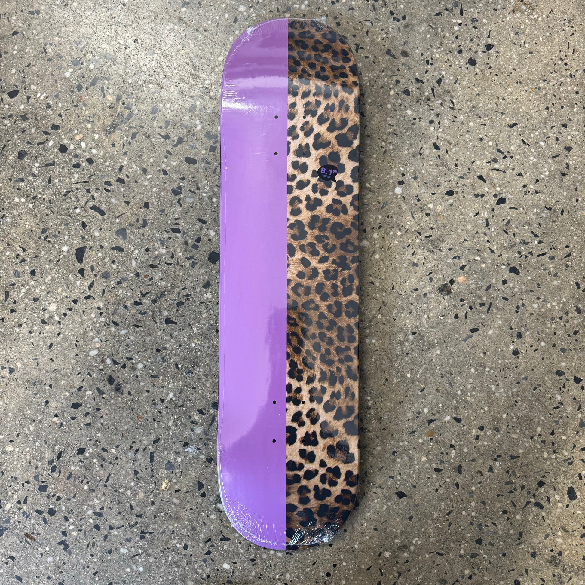 half violet half leopard print skate deck