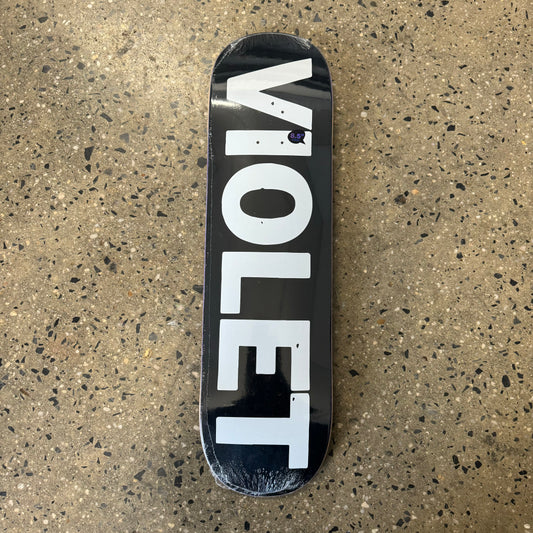 white Violet logo on black skate deck