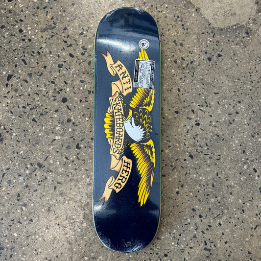 yellow and black spread wing eagle logo on blue metallic skate deck