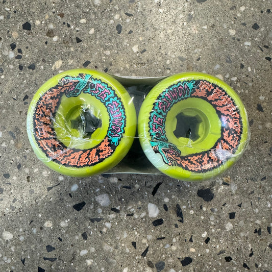 green wheels with yellow, blue, and pink design