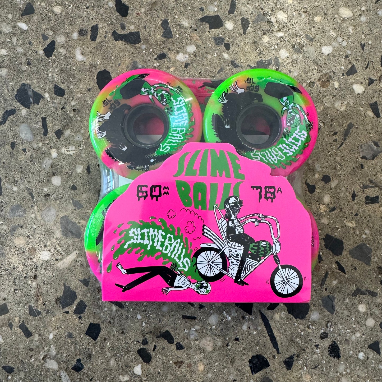 pink and green swirl wheels, black and white design