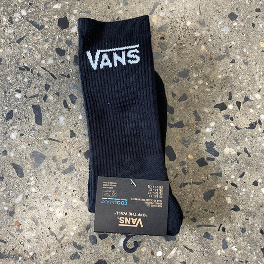 black socks with VANS typeface logo on sock