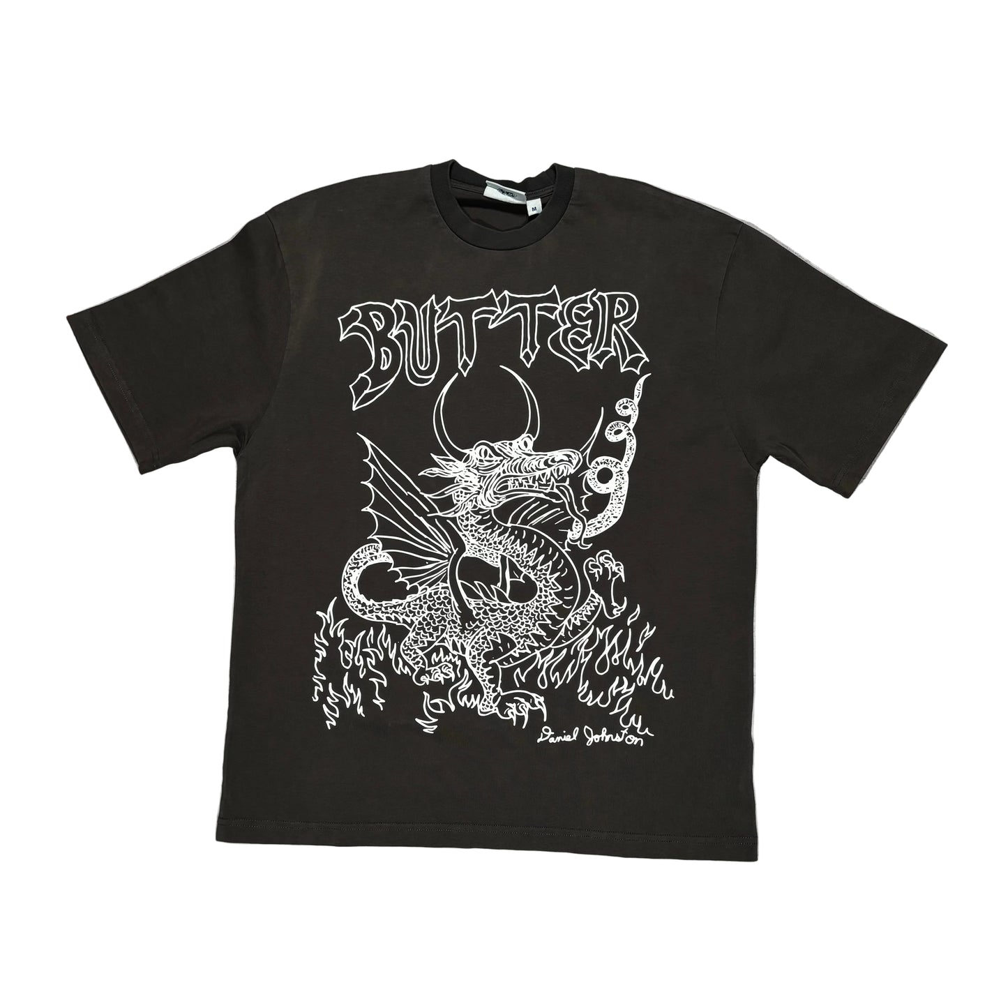 Black t-shirt with white graphic design on a white surface