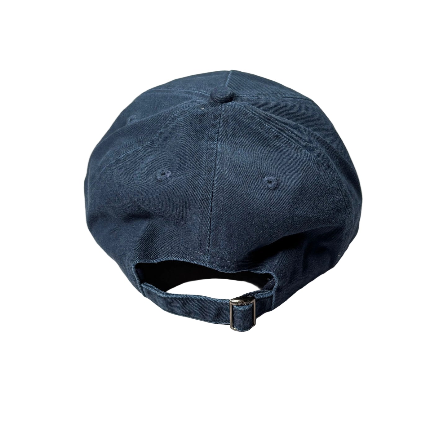 rear of Blue baseball cap on a white surface