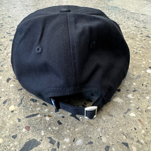 back view of black hat 