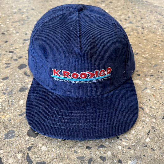 corduroy navy blue hat with red text