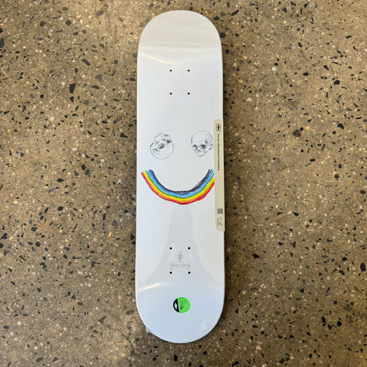 two skull heads and rainbow on white skate deck