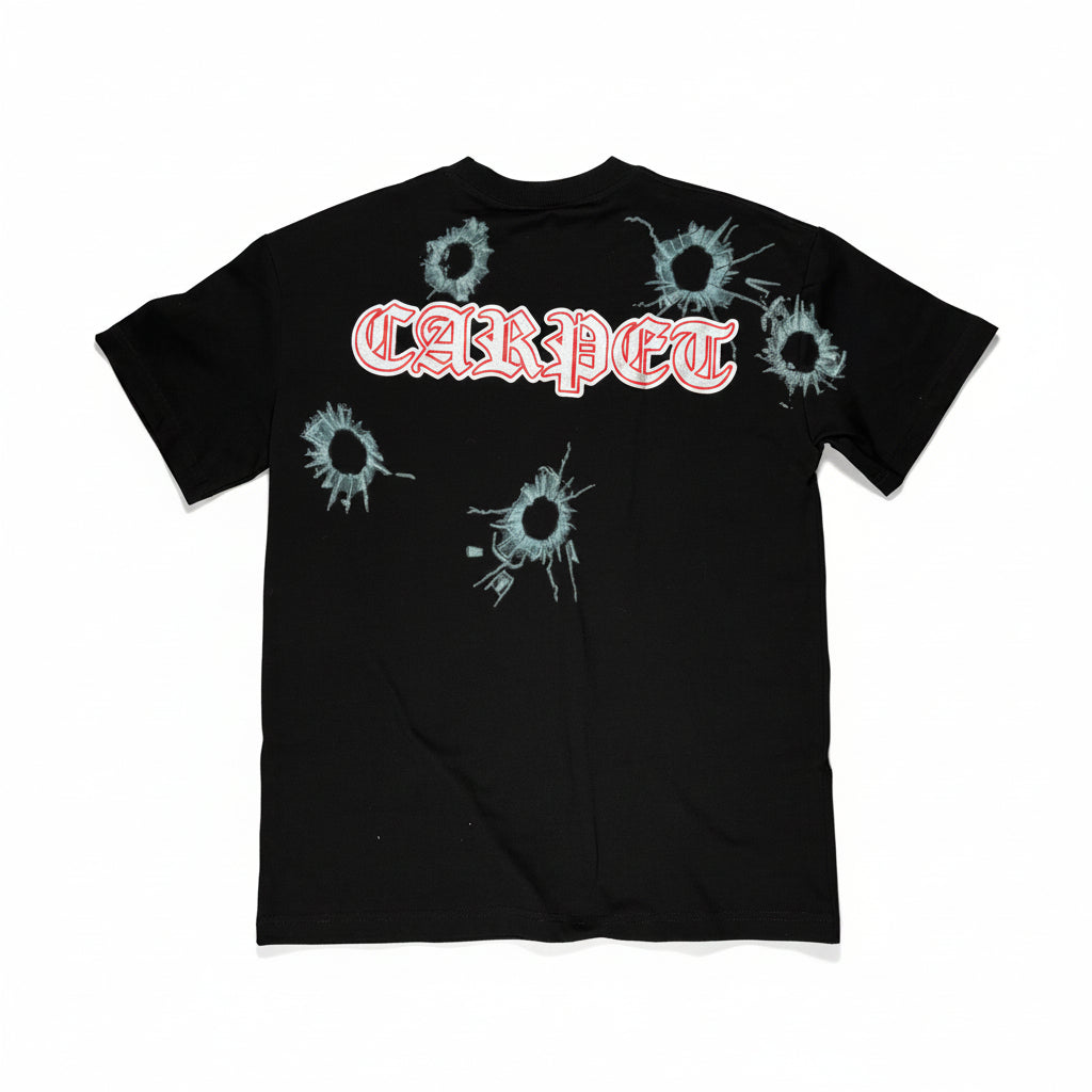 Black t-shirt with bullet hole designs and 'CARPET' text on a white surface.