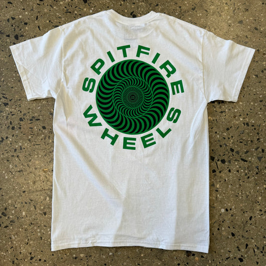 large green and black swirl logo on back of T-shirt