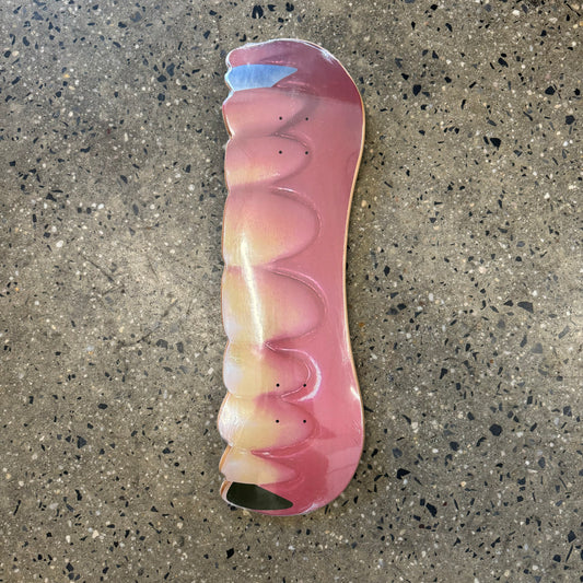 deck in the shape of dentures with dentures printed on it