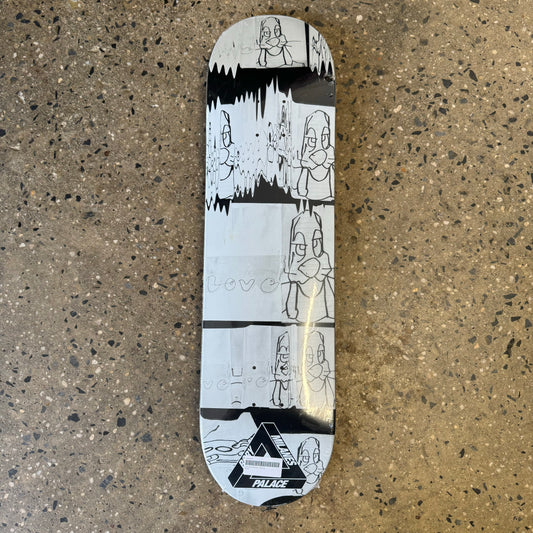 deck with white and black illustration of a dog on the bottom