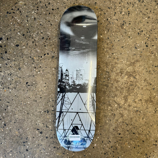 white and black deck with abstract city scape art on the bottom