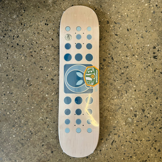 white washed woodgrain deck with blue dots on each end with a blue alien in the center