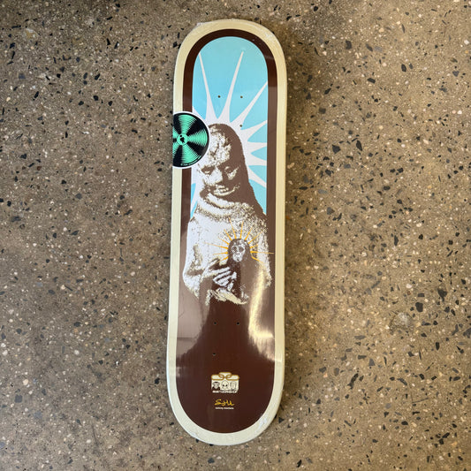 brown and cream colored deck with zombie like figure holding a monkey in the center 
