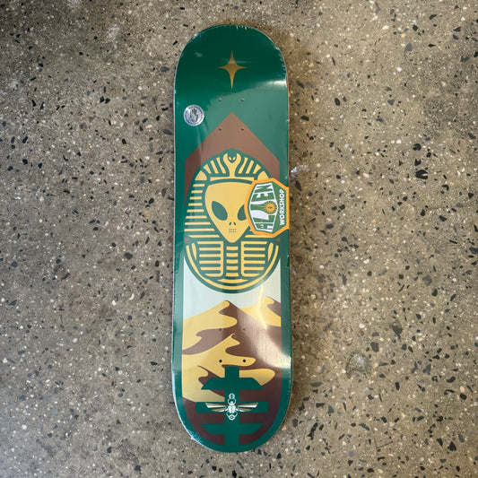 green deck with egyptian head dress on with yellow and brown accents through out the graphic