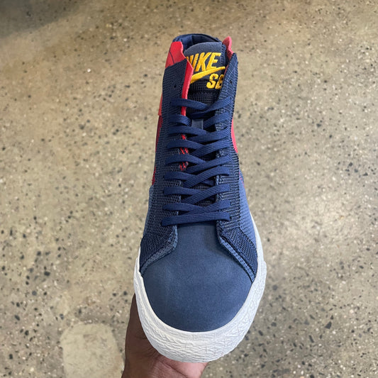 top down view of navy and red shoe, navy laces, white sole