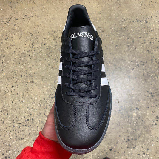 black leather sneaker with white stripes, and logo, front view